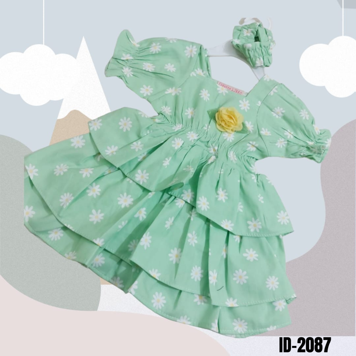 New fancy three layers light green frock with white flower